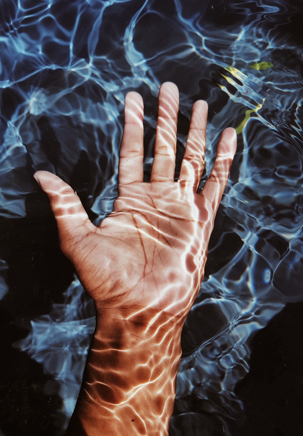 The evolutionary adaptation of wrinkling of fingers submerged in water.